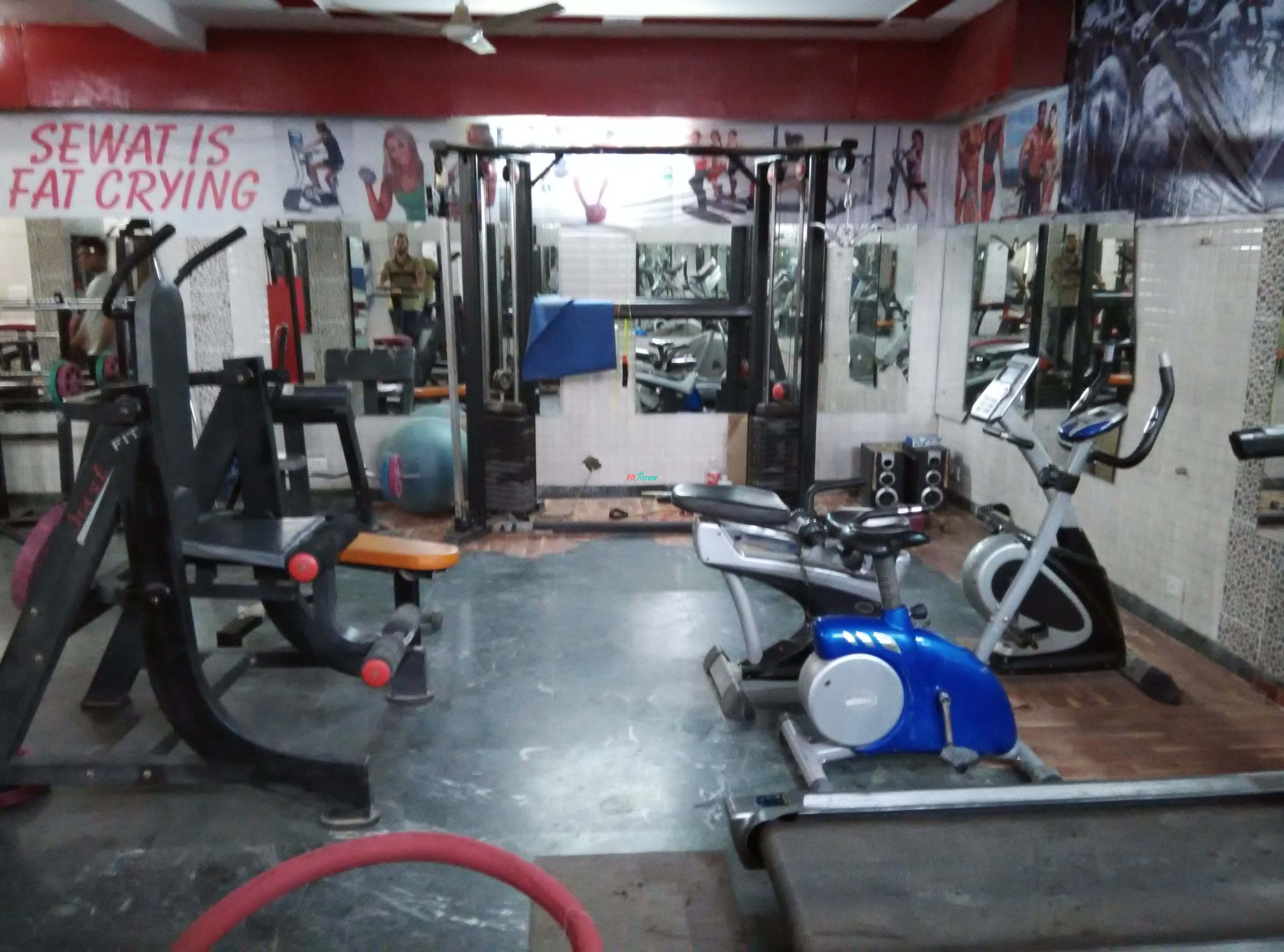 Ganpati Fitness is located at Nathupur, DLF phase 3, Gurgaon. The gym has decent facilities such as with personal trainers and with manual equipments. The environment to exercise is peaceful. The gym is located at the basement